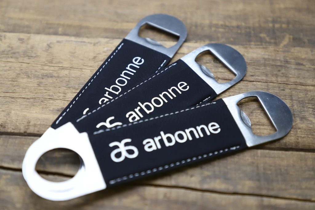 Arbonne leatherette bottle opener